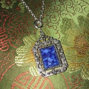 Silver necklace with blue pendant